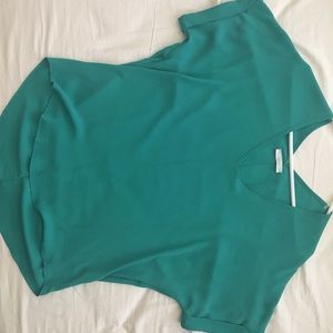 Green short sleeved shirt